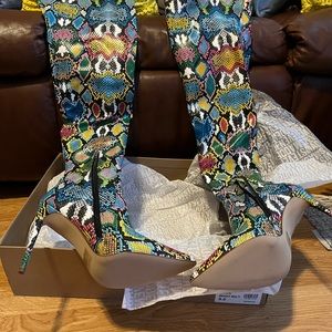 Steve Madden’s ladies high heel multicolor boots brand new. .